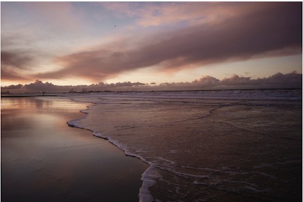 De zee bij Oostende bij zonsondergang